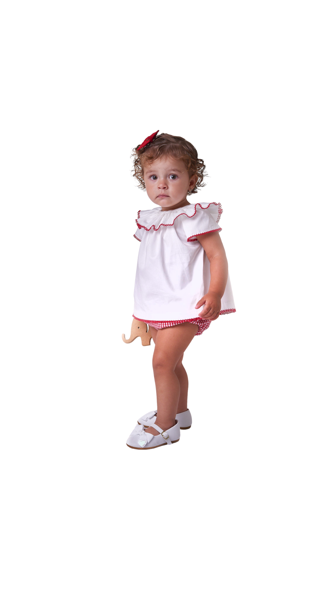Conjunto bata e tapa fralda para bebê com babados delicados e modelagem confortável, ideal para passeios e momentos especiais.

