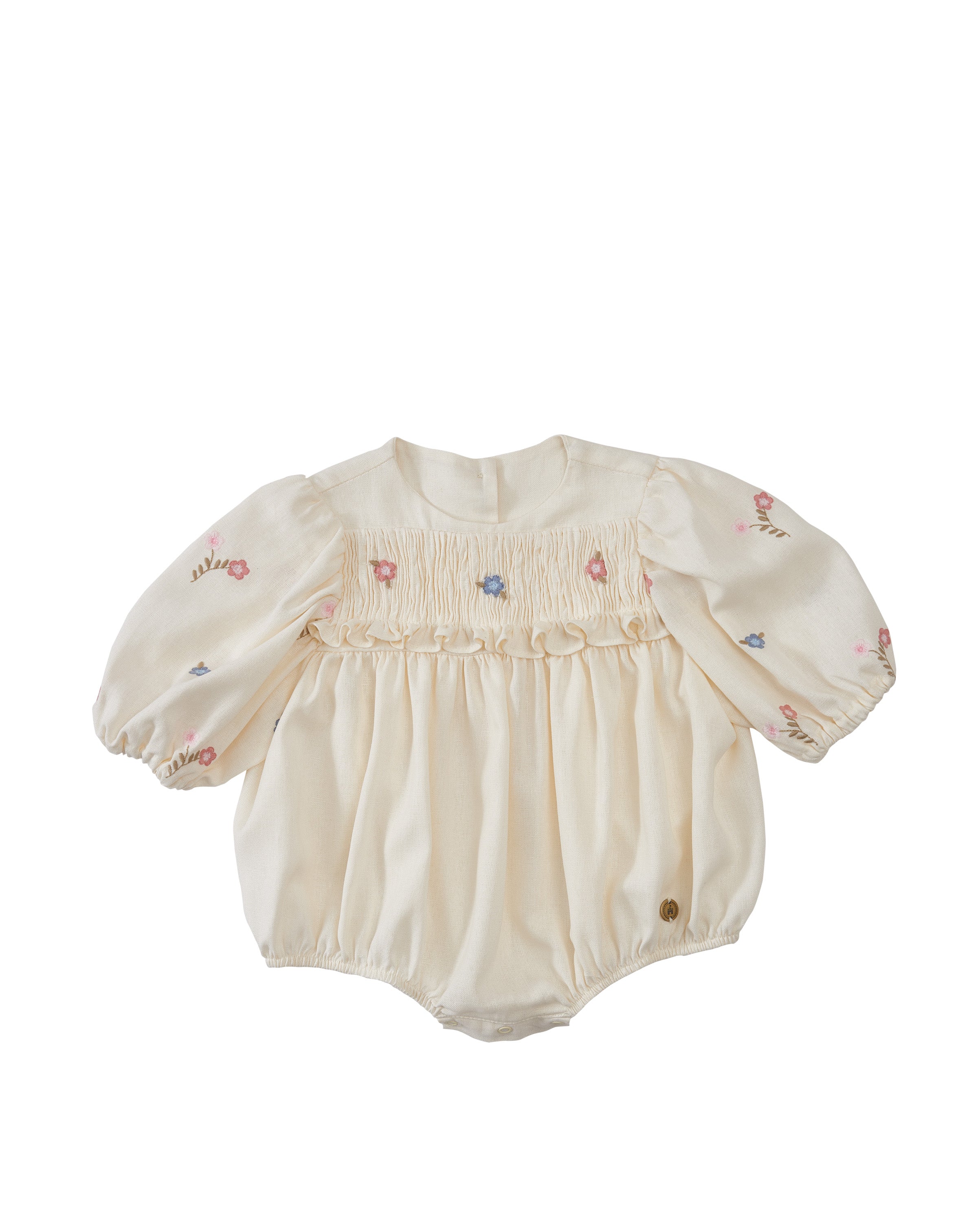 Bombacho de bebê feminino Nathalia com bordado floral, manga balonê e babadinhos, confeccionado em linho quaker.

