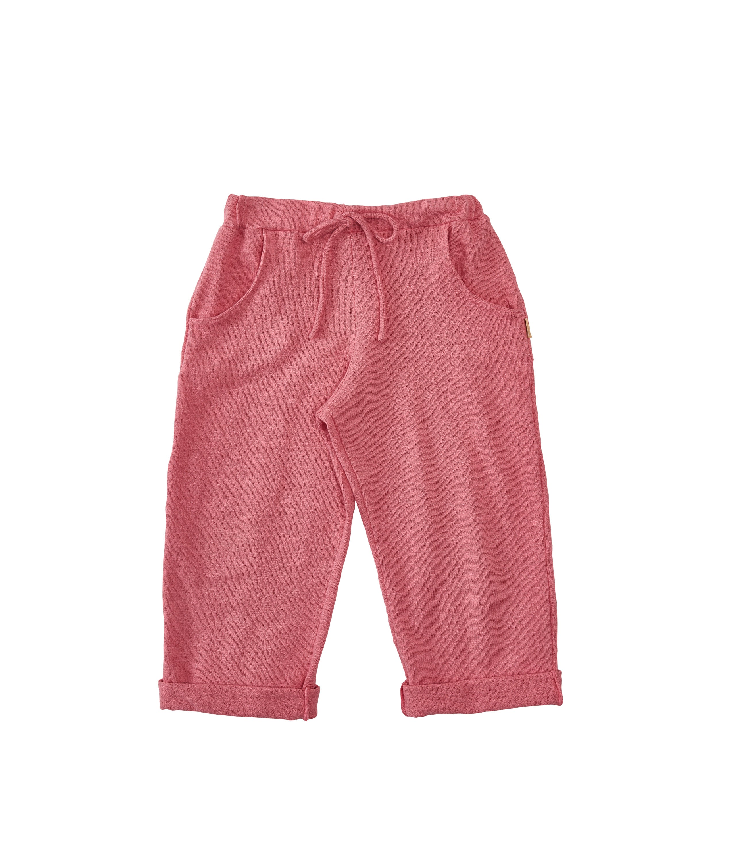 Calça Mathy infantil com bolsos laterais, caimento soltinho e cintura elástica, em malha goiaba ou linho bege.

